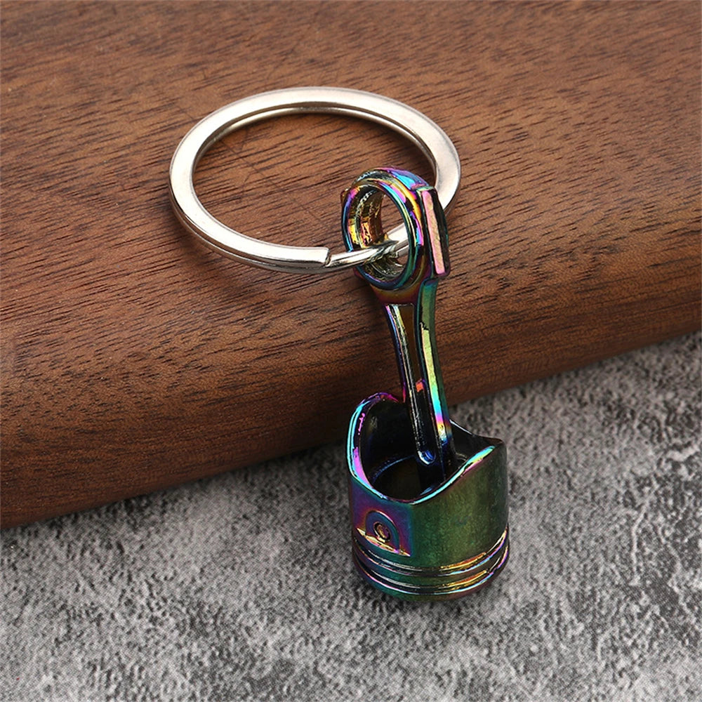 Porte clé en forme de piston