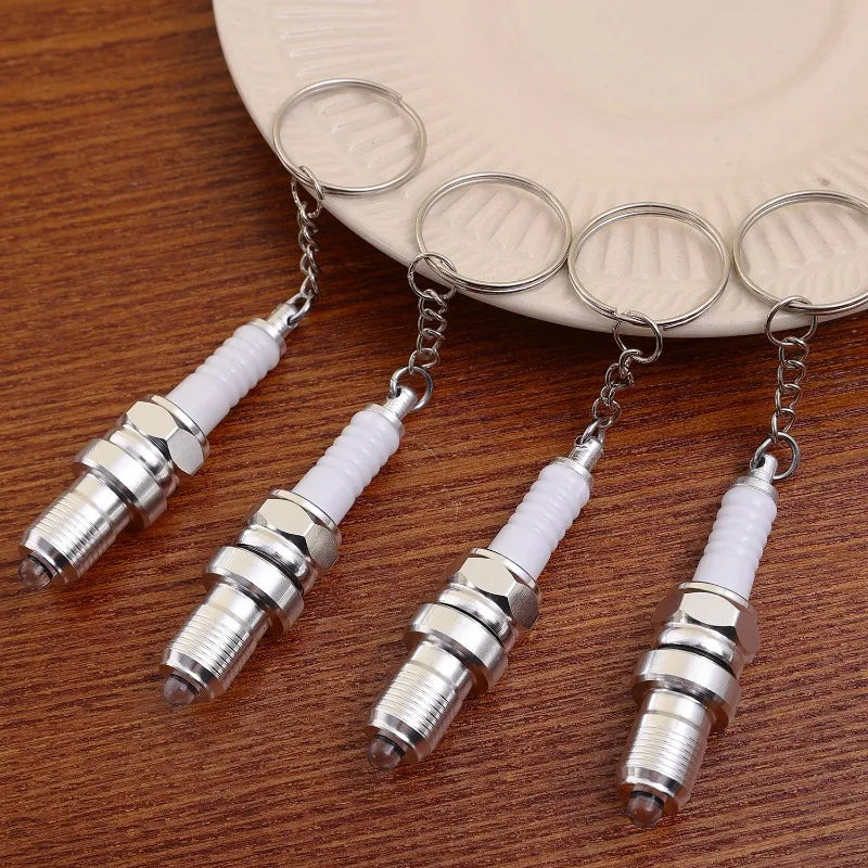Porte clé bougies de moteur lumineuse