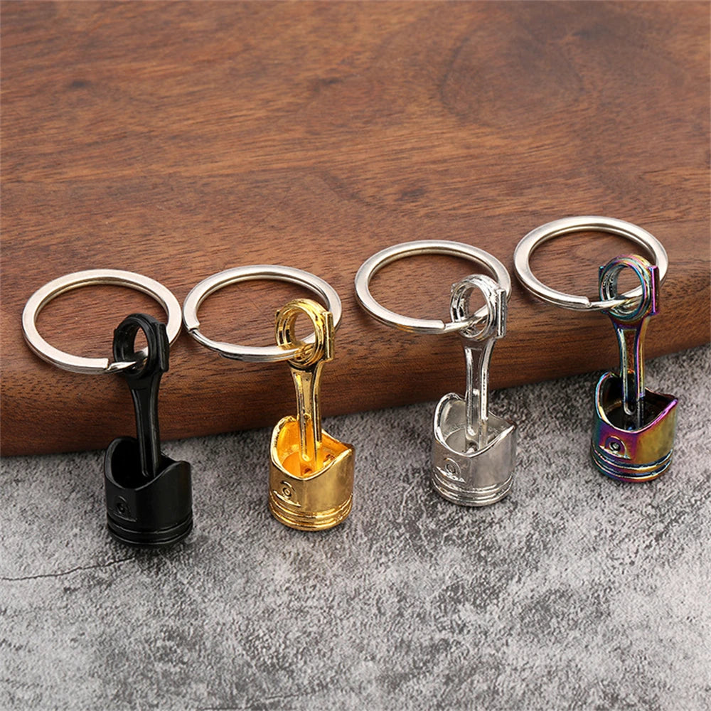 Porte clé en forme de piston