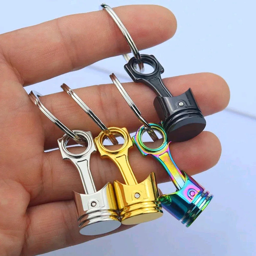 Porte clé en forme de piston