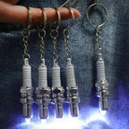 Porte clé bougies de moteur lumineuse