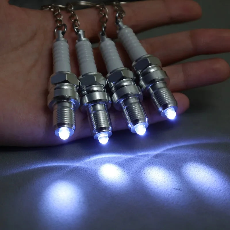 Porte clé bougies de moteur lumineuse
