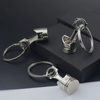 Porte clé en forme de piston