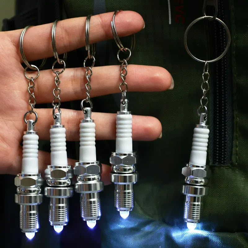 Porte clé bougies de moteur lumineuse