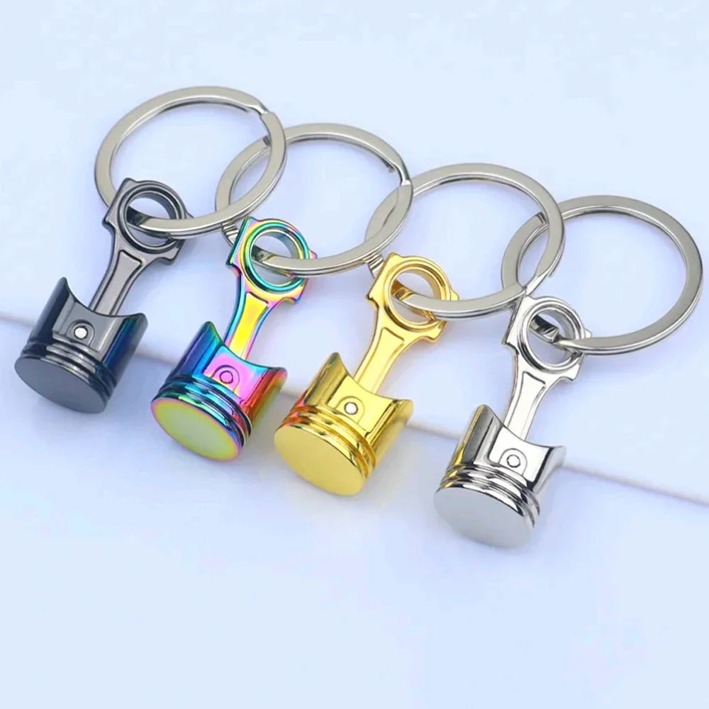 Porte clé en forme de piston